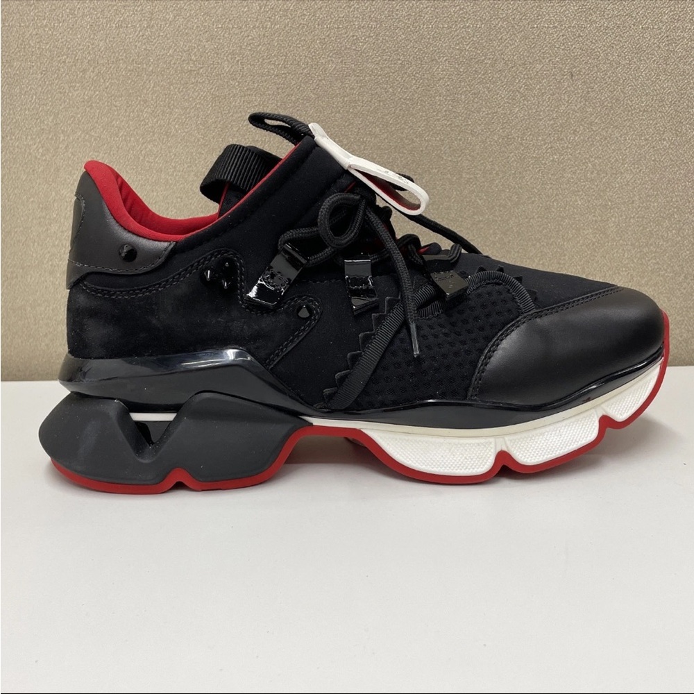 Christian Louboutin Red and Black Sneakers with Iconic Style